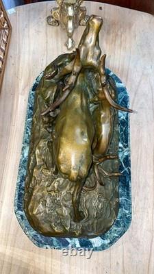 Bronze sculpture signed Pierre-Jules MENE on a green marble base