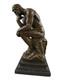 Bronze Statue The Thinker On A Black Marble Base After Rodin