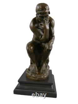 Bronze statue The Thinker on a black marble base after Rodin