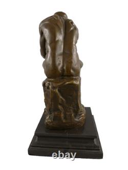Bronze statue The Thinker on a black marble base after Rodin