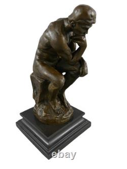 Bronze statue The Thinker on a black marble base after Rodin