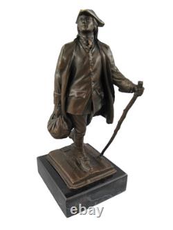 Bronze statue of Benjamin Franklin on a marble pedestal after Milo