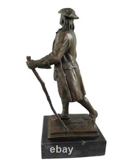 Bronze statue of Benjamin Franklin on a marble pedestal after Milo