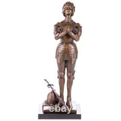 Bronze statue of Joan of Arc on a black marble pedestal after Mercier