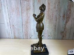 Bronze statue of Joan of Arc on a black marble pedestal after Mercier