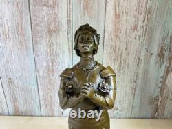 Bronze statue of Joan of Arc on a black marble pedestal after Mercier