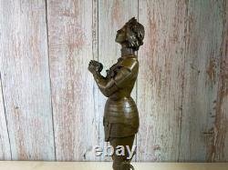 Bronze statue of Joan of Arc on a black marble pedestal after Mercier