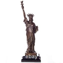 Bronze statue of Liberty on a marble base after Auguste Bartholdi