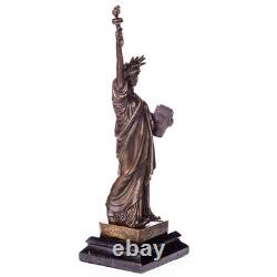 Bronze statue of Liberty on a marble base after Auguste Bartholdi