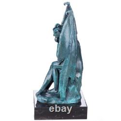 Bronze statue of a devil with green patina on a marble base after Milo