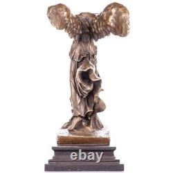 Bronze statue of the Winged Victory of Samothrace on a marble base after Nick