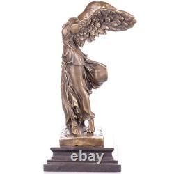 Bronze statue of the Winged Victory of Samothrace on a marble base after Nick
