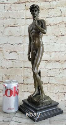 Bronze statue signed by David, nude mythological figure on a marble base