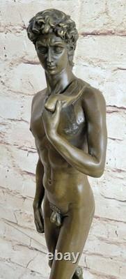 Bronze statue signed by David, nude mythological figure on a marble base