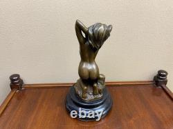 Bronze woman sculpture on a black marble base after Milo
