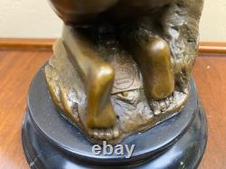 Bronze woman sculpture on a black marble base after Milo