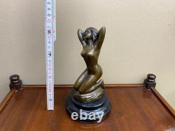 Bronze woman sculpture on a black marble base after Milo
