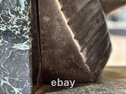 C. CHARLES Pair of Art Deco bookends, bronze pharaohs on marble. Signed