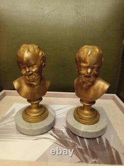 Child Bust. Gilded Bronze on Marble. France. 19th/20th Century.