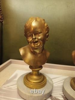 Child’s Bust. Gilt Bronze on Marble. France. 19th/20th Century