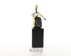 Colored sculpture of a woman in bronze on a black marble base after Nick