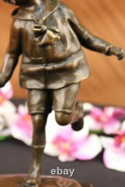 D. H Chiparus Statue of Boy with Loop Made of Bronze on a Marble Base Signed