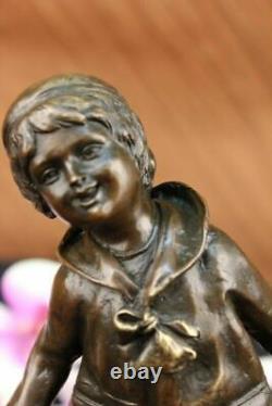 D. H Chiparus Statue of Boy with Loop Made of Bronze on a Marble Base Signed