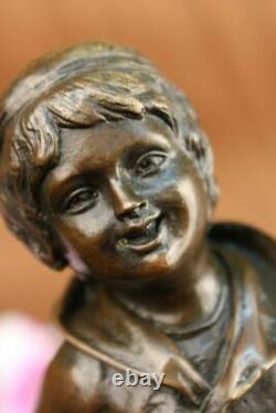 D. H Chiparus Statue of Boy with Loop Made of Bronze on a Marble Base Signed