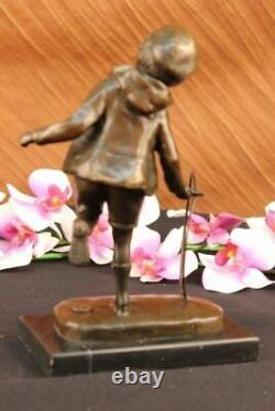 D. H Chiparus Statue of Boy with Loop Made of Bronze on a Marble Base Signed