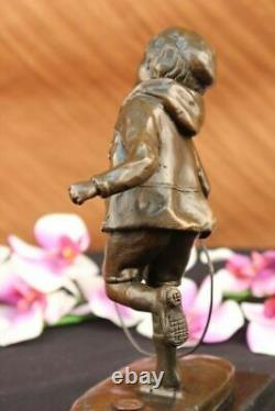 D. H Chiparus Statue of Boy with Loop Made of Bronze on a Marble Base Signed