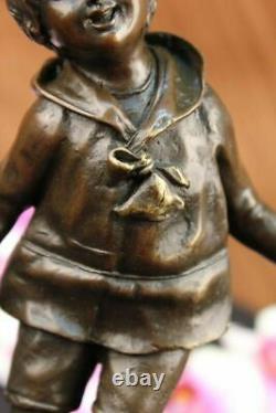 D. H Chiparus Statue of Boy with Loop Made of Bronze on a Marble Base Signed