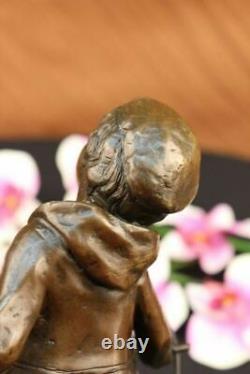 D. H Chiparus Statue of Boy with Loop Made of Bronze on a Marble Base Signed