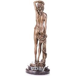 Female nude bronze figurine on an Antique signed black marble