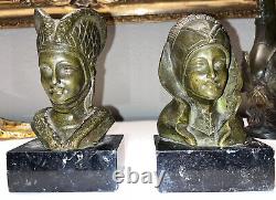 GARREAU (born in 1885) Pair of Art Deco bronze bookends on marble Signed