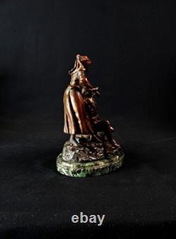 Georges Omerth bronze sculpture on marble of a nurse caring for a soldier