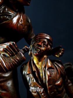 Georges Omerth bronze sculpture on marble of a nurse caring for a soldier