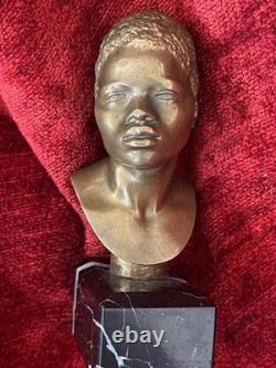 Golden bronze bust sculpture portrait of an African man signed and numbered on marble base