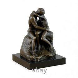 Impressionist bronze sculpture The Kiss on black marble after Rodin
