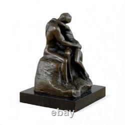 Impressionist bronze sculpture The Kiss on black marble after Rodin