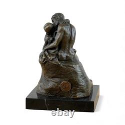 Impressionist bronze sculpture The Kiss on black marble after Rodin