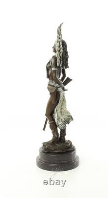 Indian Woman Sculpture with Rifle on a Black Marble Base Signed