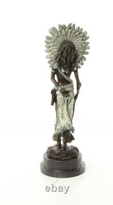 Indian Woman Sculpture with Rifle on a Black Marble Base Signed