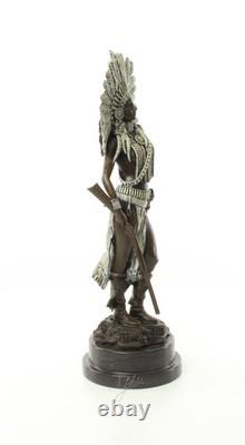 Indian Woman Sculpture with Rifle on a Black Marble Base Signed