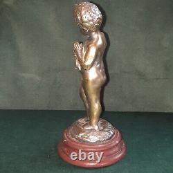 L. Kley. Bronze Signed. Putto On Red Marble Base
