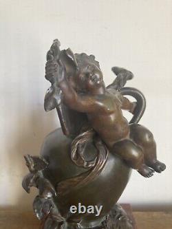 Love Seated on a Bronze and Marble Jar Signed Moreau Circa 1900