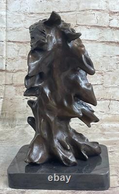 Marbled Bronze Sculpture of an American Milo, Signed, on a Tree Branch, For Sale