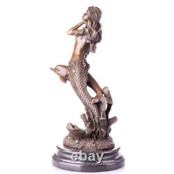 Mermaid sculpture with dolphin in bronze on black marble after Milo