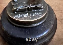 Michelangelo bronze statue of a nude man, signed, on a marble base, 20th century