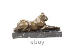 Modern Bronze Sculpture of a Cat Leaning on Black Marble