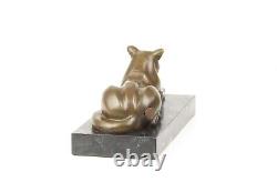 Modern Bronze Sculpture of a Cat Leaning on Black Marble